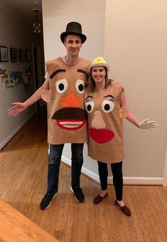 a man and woman dressed up in costumes