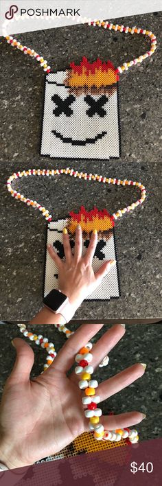 a person's hand is shown with beaded beads on it and the words poshmark are in front of them