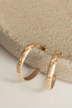 Flora Hoop earrings They give instant heirloom vibes, which we are here for! Made in 14k gold fill, meaning they are tarnish resistant and won't have to worry about discoloring on the skin. Plus, 14k gold fill is a metal that is hypoallergenic making perfect for those with sensitive ears. Measure approx 1 inch in diameter Anniversary 14k Rose Gold Filled Hoop Earrings, Tarnish Resistant 14k Gold Filled Hoop Jewelry, 14k Gold Stamped Hoop Jewelry, Engraved 14k Gold-filled Jewelry, Engraved 14k Gold Filled Jewelry, Dainty Recycled Gold Hoop Earrings, Rose Gold Plated Hoop Earrings Tarnish Resistant, Dainty Recycled Gold Round Hoop Earrings, Tarnish Resistant 14k Gold Filled Huggie Earrings For Anniversary