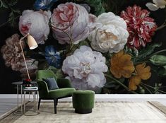 a living room with a large floral wall mural