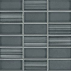 a gray glass tile wall that is very close up