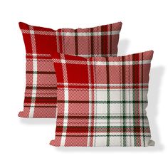 two red and white plaid pillows sitting next to each other