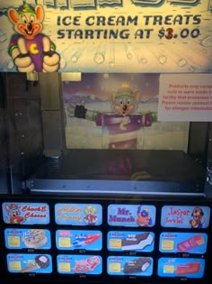 an ice cream vending machine with cartoon characters on it