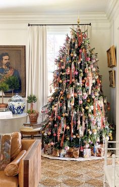 a decorated christmas tree in a living room