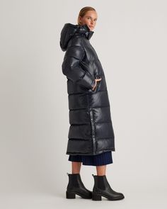 When a style is trending hard but also never going anywhere... Case in point: this shiny black version of our Responsible Down Long Puffer Jacket. With a classic fluffy quilt and 700+ fill power goose down, it's super warm, water and wind resistant, edgy-chic, and always fairly priced at $179.90. Fitted Duck Down Puffer Jacket, Casual Fitted Duck Down Puffer Jacket, Casual Winter Puffer Jacket In Recycled Polyester, Black Polyamide Outerwear For Fall, Casual Recycled Polyester Puffer Jacket For Winter, Fitted Duck Down Outerwear For Cold Weather, Functional Down Puffer Jacket With Ribbed Cuffs, Fitted Nylon Puffer Jacket With Ribbed Cuffs, Fitted Solid Nylon Puffer Jacket