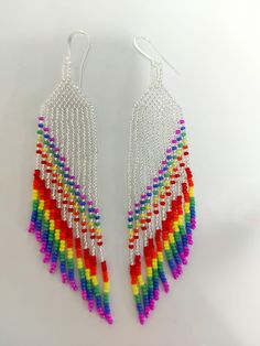 Party In Your Ear Fringe Earrings - Silver Lined  These beautiful sparkling fringes are full of fun and colour! Handmade using #11 Czech glass seed beads 5 inches long  nickel free hooks Beaded Fringe Earrings Native American, Free Fringe Earring Pattern, Rainbow Fringe Earrings, Glass Seed Bead Crafts, Fringe Beaded Earrings Pattern, Rainbow Beaded Earrings, Seed Bead Earring Patterns, Loom Beading Patterns Free, Beaded Jewelry Patterns Free