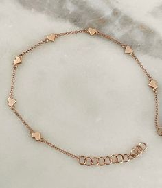 14K Solid Gold 7 dainty stars/hearts on fine chain  The length is adjustable from 6-7 inches Bracelet is perfect for layering and everyday wear Adjustable Delicate Heart Charm Bracelet, Delicate Rose Gold Heart Bracelet For Everyday Wear, Delicate Rose Gold Heart Bracelet For Everyday, Rose Gold Chain Bracelet With Heart Charm, Dainty Adjustable Bracelet With Heart Pendant, Dainty Adjustable Heart Pendant Bracelet, Dainty Rose Gold Chain Bracelet With Heart Charm, Delicate Rose Gold Bracelet With Heart Charm, Elegant Rose Gold Heart Bracelet With Adjustable Chain