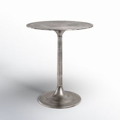 a small round table with a metal base