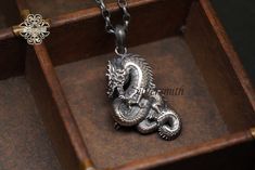 **Silver chain not included ** Click this link to shop our silver chains: https://www.etsy.com/hk-en/shop/silversmithhk?ref=l2-about-shopname&section_id=37505143 Dragon pendant without chain Material: 925 Silver Made in Hong Kong Designed by Ivan Keung Swan Necklace, Phoenix Pendant, Silver Swan, Silver Chains, Silver Dragon, Dragon Pendant, Silver Work, Sterling Silver Pendants, Pendant Necklaces