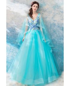 Buy Aqua Blue Ballroom Pageant Formal Dress With Cape For Quinceanera at wholesale price online. Free shipping and pro custom service since 2009. Blue Quince Dress With Cape, Blue Tulle Gown For Spring, Spring Blue Tulle Gown, Blue V-neck Summer Gown, Blue V-neck Gown For Spring, Blue Floor-length Gown For Spring, Quince Dress With Cape, Formal Dress With Cape, Blue Quince Dress