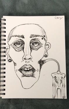 a drawing of a woman's face with teary eyes and nose piercings