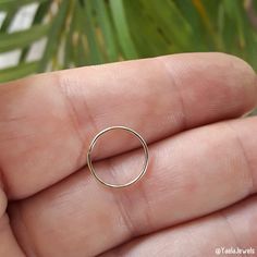 Simple and delicate belly button hoop ring. It comes in 14k goldfilled or 925 sterling silver and its nickel-free. A small opening in the hoop that you twist open to put on and close once in. ★Available Gauge: 20(0.8mm), 18 (1mm) in 8mm, 10mm or 12mm diameter. ★Note: Please Choose Accurate size for your piercing The perfect gift for you or your loved ones. 🔸🔸BELLY BUTTON ARE FINAL SALE DUE TO HYGIENIC REASONS🔸🔸 In the picture: 20g - 12mm ★Packaging All items are packed in an elegant jewelry 14k Gold Circular Metal Ring, Nickel Free Hoop Septum Ring For Wedding, Nickel-free Hoop Septum Ring For Wedding, Hypoallergenic Yellow Gold Sterling Silver Stackable Rings, Small Hoop 14k Rose Gold Rings, 14k Rose Gold Nose Rings, Gift Internally Threaded Hoop Belly Rings, Nickel Free Hoop Septum Ring For Everyday Wear, Nickel-free Hoop Septum Ring For Everyday