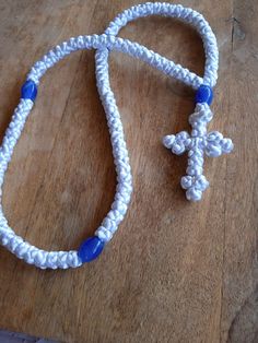 100 knot prayer rope  White Satin cord  4 Blue plastic beads with iridescences white Ending: Knotted Cross  **Made with love and prayers** For bless, protection and prayer Blessed on the lerics of Saints and Holy cross Anointed With myrrh/ anointing oil Prayer with rosary, which is very helpful in concentrating the mind  and pray with says following greetings: Lord Jesus Christ have mercy on me Adjustable White Rosary With 108 Beads, Anointing Oil Prayer, Love And Prayers, Anointing Oil, Christian Prayers, Orthodox Christianity, Birthday For Him, Jesus Christus, Holy Cross