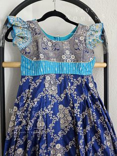 This Long frock suits 7 yr - 8 yr. Kindly please contact us if needed measurements before purchase. Fitted Anarkali Frock For Party, Traditional Blue Dress With Ruffles, Traditional Blue Ruffled Dress, Fitted Festive Frock For Dress-up, Festive Fitted Frock For Dress-up, Blue Fitted Dress-up Sets, Fitted Frock With Pallu For Festive Occasions, Fitted Frock With Pallu For Diwali, Fitted Anarkali Frock For Festivals