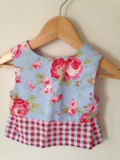 Beautiful peplum top made from Cath Kidston Rosali fabric and finished with vintage buttons. Size 6-12 months. Measures 19 1/2 inches across the chest. Fitted Tops With Buttons For Playtime, Cath Kidston, Vintage Buttons, Girl Top, 12 Months, Peplum Top, Floral Tops, Girl Outfits, Tops & Tees