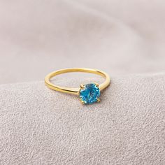 Blue topaz; It is believed to bring prosperity. The color is soothing. The color of those born in December is blue topaz. With its special design, our 14k solid gold and round cut blue topaz ring is suitable for daily use and will be your indispensable jewel that you can use on your special days. A stylish jewel for you and your loved ones. Time to pamper yourself and your loved ones... 🤍🤍 Special gifts for your special moments. We produce our jewelry in the most perfect way for you. 🤍🤍 All Blue Solitaire Birthstone Ring In 14k Gold, Gift Topaz Solitaire Ring, Blue 14k Gold Birthstone Ring For Promise, Blue 14k Gold Birthstone Promise Ring, Gift Topaz Birthstone Ring With Round Cut, Topaz Birthstone Ring With Center Stone For Gift, Gift Round Cut Topaz Birthstone Ring, Gold Solitaire Blue Topaz Ring, Promise Ring Solitaire Topaz Birthstone