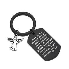 a keychain with an angel charm on it that says, always at the moment you