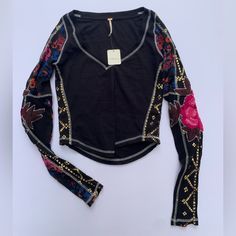 New With Tags Free People Long Sleeve Shirt. Size Xs. Color Black. Embroidered. Amara Top. Stretch V-neck Top For Festival, Black V-neck Tops With Floral Embroidery, V-neck Festival Tops For Fall, Black Bohemian Crew Neck Top, Embroidered Stretch Cotton Tops, Stretch Tops For Fall Festival, Embroidered Stretch Long Sleeve Tops, Stretch Embroidered Long Sleeve Tops, Black Embroidered Stretch Tops