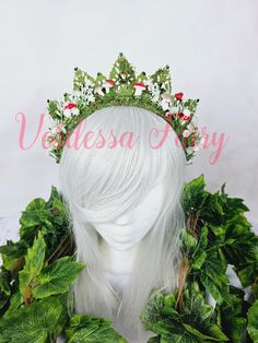 This green fairy crown is an enchanting green forest crown with mushrooms and gypsum, ideal for photo shoots, special events, cosplay and making your outfit pop.  Mounted to a comfortable headband, this piece is easy to wear and fuss free. If this is for a performance, or if you have a smaller head, or if it for a child, select the option with an added slide comb, for extra security. There are small handmade light brown mushrooms and pops of little red toadstools. green glimmers of glass rhinest Mushroom Fairy Crown, Fairy Halo Crown, Moss Crown, Forest Queen Crown, Fairy Leaf Hat, Mushroom Crown, Fairy Crowns Diy, Forest Crown, Crystal Forest Crown