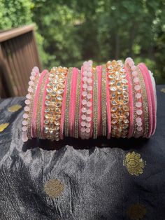 Traditional Pink Bracelet For Festive Season, Traditional Pink Bracelet For Festive Occasions, Traditional Pink Bracelets For Festive Season, Traditional Pink Bracelets For Festive Occasions, Festive Pink Bracelets With Gota Work, Festive Pink Bracelet With Gota Work, Festive Pink Cutdana Bangle, Pink Cutdana Bangle For Diwali, Traditional Pink Festive Bangle