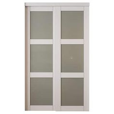 a white sliding door with frosted glass on the front and side panels, in an open position