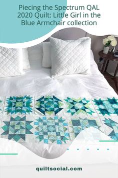 a bed with pillows and quilts on it