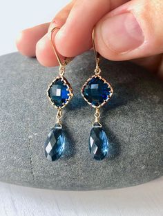 Blue Quartz Earrings, Dark Blue Statement Earrings, Royal Blue Gold Drops, September Birthstone, Navy Blue Jewelry, Indigo Blue Gift for her These earrings feature 10mm faceted deep blue quartz diamond shape stones bezeled set in gold filled and suspended from them are 12 mm natural blue quartz teardrops. The earrings are suspended from gold filled lever back ear wires. These are deep rich blue color, ideal for summer outfits, very feminine and elegant color, that will match many outfits in your Blue Birthstone Earrings For Formal Occasions, Formal Blue Birthstone Earrings, Blue Sapphire Birthstone Earrings, Blue Dangle Crystal Earrings For Formal Occasions, Blue Faceted Jewelry For Formal Occasions, Blue Sapphire Earrings For Pierced Ears, Blue Gemstone Accented Earrings For Formal Events, Blue Gemstone Accented Earrings For Formal Occasions, Blue Gemstone-accented Earrings For Formal Occasions