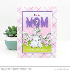 a mother's day card with a bunny on it and a succulent plant