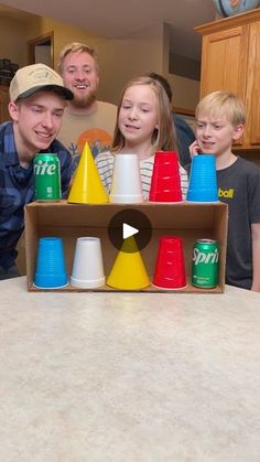 Family Olympics Games Indoor, Home Made Games For Family, Cup And Ball Game Diy, Paper Cup Games, Diy Family Games Indoor, Family Fun Games Indoor Activities, Game Show Party Ideas, Game Show Party, Beach Games For Adults