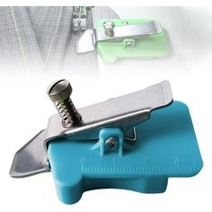 a close up of a blue tool holder with a wrench on the bottom and an image of a piece of luggage in the background