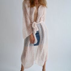 Hello, I'm the one, who won't let you down - blush pink mohair cardigan. I will comfort you, keep you warm and will make you smile. I'm 100% hand made and proud of that. I consist of 70% italian kid mohair and 30% of silk, which makes me incredibly natural. I'm quite unique as could be worn all year long.I'm in one size and one size fits all because my measurements are :❤️   Width -50 cm❤️   Lengths -128 cmIf you would like me in other size, you could request a custom order with your own paramet Pink Long Cardigan, Dress Beach Outfit, Wedding Cardigan, Mesh Cardigan, Cardigan Kimono, Loose Cardigan, Maxi Cardigan, Belted Cardigan, Tropical Dress