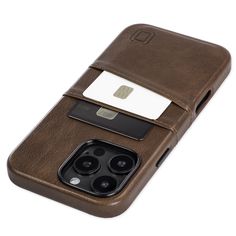 an iphone case with a credit card slot and two camera lens attachments on the back