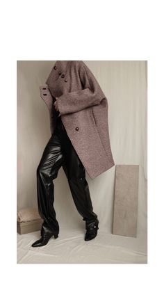 Make a bold fashion statement this winter with our oversized bouclé wool coat. This cocoon coat features a high collar, a wrap-over lapel with concealed button closure, side  seam pockets, and full lining. The kimono sleeves add a touch of elegance, while the relaxed, boxy fit ensures effortless layering. Stay warm and stylish all season long.  ⏀While it supports beautifully the boxy silhouette of this coat, bouclé wool can be quite stiff to the touch. ⏀Crafted with 3 yards of fabric, this coat Trendy Oversized Turtleneck Outerwear, Brown Turtleneck Outerwear For Cold Weather, Elegant Oversized Turtleneck Outerwear, Chic Oversized Turtleneck Outerwear, Oversized Brown Turtleneck Outerwear, Turtleneck Trendy Workwear Outerwear, Trendy Turtleneck Outerwear For Work, Oversized Turtleneck Outerwear For Fall, Chic Oversized Wool Coat With Button Closure