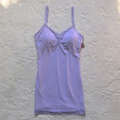 95% Cotton, 5% Spandex Built In Shelf Bra Style: Form Fitting Fitted Purple Camisole With Built-in Bra, Fitted Purple Top With Adjustable Straps, Purple Camisole With Built-in Bra, Purple Camisole With Built-in Bra And Spaghetti Straps, Fitted Purple Camisole With Spaghetti Straps, Spring Camisole With Medium Bust Support And Stretch, Spring Camisole With Medium Bust Support, Stretchy Purple Camisole, Stretch Purple Camisole