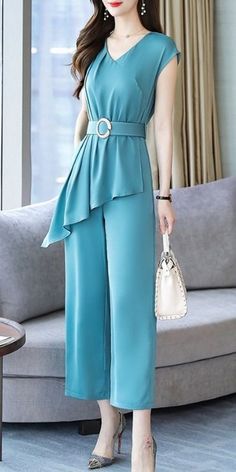 Blue turquoise elegant classy chic dressy jumpsuit for women sleeveless with waist belt. Unique fashion formal design to raise your elegance. Elegant Solid Color One-piece Jumpsuit, Elegant Solid Color One-piece Jumpsuit Or Romper, Elegant Solid Color One-piece Jumpsuits And Rompers, Elegant One-piece Jumpsuits And Rompers In Solid Color, Elegant One-piece Jumpsuit For Work, Elegant One-piece Jumpsuits And Rompers For Work, Chic Light Blue Sleeveless Jumpsuits And Rompers, Chic Fitted Light Blue Jumpsuits And Rompers, Chic Light Blue Fitted Jumpsuits And Rompers