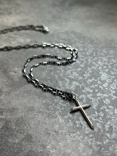 "Cross Necklace Chain Necklace for Men / Women With Black Oxidized Silver Chain | Sterling Silver Mens Necklace | Mens Cross Necklace Unique Solid Sterling Silver cross pendant necklace, a timeless piece of Christian jewelry styled with contemporary aesthetic. Unique Chain features a stylish black oxidized finish that adds depth and character to the design.  Black silver chain features geometric razor blade-shaped links, treated with a charcoal black oxidized finish. The sparkling silver edges add a touch of edginess, revealing the underlying silver color of the necklace. The cross pendant, made in bright sterling silver, beautifully complements the boldness of the chain. The cross chosen for this chain embodies simplicity and elegance, making it a versatile accessory that will stand out o Mens Cross Necklace Silver, Silver Mens Necklace, Chain Cross Necklace, Chain Necklace For Men, Oxidised Silver Jewelry, Mens Cross Necklace, Necklace Mens, Mens Necklace, Sterling Silver Cross Pendant