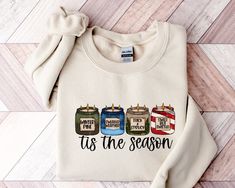 Tis The Season Sweatshirt, Christmas Sweatshirt, Sweater Weather, Winter Candle Sweatshirt, Cute Winter Sweatshirt, Winter Pine Sweater  ORDER INSTRUCTIONS  ➤ Check and review all listing photos. ➤ Pick up your item's size and color from drop down menus. ➤ Choose the quantity. ➤ Click "Add to Cart" button. ➤ Fill in the personalization box as recommended if provided.  ➤ You can go back to add more item or you can complete the checkout process. ➤ Click "Proceed to Check Out".  WHICH SIZE FITS ME Sweater Shirt Outfit, Outfit Ideas Shirt, Winter Candle, Sweatshirt Cute, Winter Sweatshirt, Sweatshirt Christmas, Trending Today, Winter Sweaters, Christmas Sweatshirts