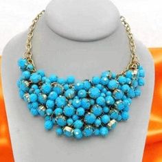 This is a beautiful Turquoise and gold cha cha bib type necklace. In good condition. Makes a nice gift. Turquoise Round Beads Necklace For Party, Turquoise Necklaces With Round Beads For Party, Turquoise Costume Jewelry Necklace For Party, Turquoise Beaded Necklace For Parties, Turquoise Colorful Beads Costume Jewelry Necklace, Turquoise Costume Jewelry Necklaces With Colorful Beads, Turquoise Costume Jewelry Necklace With Colorful Beads, Elegant Gold Turquoise Necklace With Colorful Beads, Turquoise And Gold