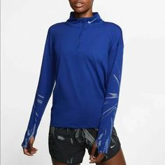 In New Condition. Functional Blue Tops For Winter, Functional Blue Winter Tops, Functional Blue Long Sleeve Tops, Blue Technical Long Sleeve Top, Technical Blue Long Sleeve Tops, Functional Blue Top For Spring, Functional Blue Spring Top, Blue Winter Workout Tops, Nike Blue Sportswear Top