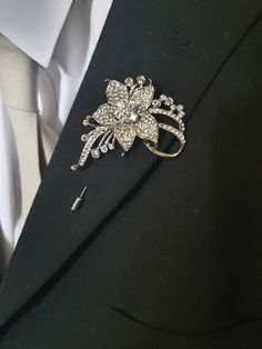 "Rhinestone Crystal rose  buttonhole with  stylish capped Pin style attachmen,  for best man, usher wedding party great Gatsby theme . >> CUSTOMIZE THIS ITEM << As beautiful as it is you may want to add your own touch to better suit your needs? I accept bespoke /custom orders and would be more than happy to incorporate your wedding colours and ideas. use the custom order button above :)   **The colours shown on screen may not 100% accurately reflect the colors of our fabrics etc..  They will be Elegant Rhinestone Pins For Wedding, Elegant Flower Shaped Pins For Party, Elegant Flower Pins For Parties, Elegant Flower-shaped Party Pins, Elegant Flower Shaped Party Pins, Classic Silver Wedding Pins, Elegant Silver Lapel Pin For Groom, Silver Wedding Brooch Pin, Wedding Silver Brooch Pin