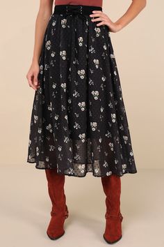 Composing a perfect outfit is simple thanks to the Lulus Convincingly Sweet Black Floral Clip Dot Lace-Up Midi Skirt! Lightweight woven fabric boasts a darling design of tonal clip dots and cute floral print as it shapes a high, smocked waist with a functional lace-up detail at the front. Skirt has a flaring silhouette and falls to a midi hem. Fit: This garment fits true to size. Length: Mid-calf length. Size medium measures 34" from waist to hem. Waist: Fitted - elastic waist allows stretch. Hi Elegant Polka Dot Bottoms For Spring, Elegant Polka Dot Spring Bottoms, Feminine Black Skirt For Spring, Spring Skirt With Polka Dot Pattern And Elastic Waistband, Knee-length Black Skirt For Daywear, Elegant Polka Dot Skirt For Spring, Black Lined Skirt For Daywear, Black Daywear Lined Skirt, Elegant Polka Dot Flowy Skirt Bottoms