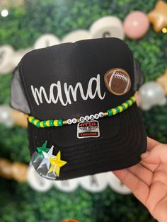 Friday Night Lights hair? Don't care!  Every football mom needs one of our custom trucker hats to wear on Friday nights. I also have different colored footballs, baseballs, soccer balls, hockey sticks, volleyballs and basketballs!   All our hats are totally customizable, so message us to request custom colors or patches. We can build a custom listing just for you! Team-colored Adjustable Snapback Trucker Hat, Adjustable Team-colored Snapback Trucker Hat, Adjustable Team-colored Trucker Hat For Game Day, Customizable Black Trucker Hat For Gift, Green Adjustable Customizable Trucker Hat, Customizable Adjustable Green Trucker Hat, Black Trucker Hat For Game Day, Adjustable Snapback Trucker Hat For Game Day, Adjustable Black Trucker Hat For Sports