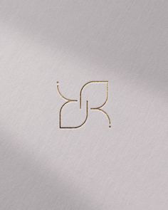 the letter r is made up of gold lines