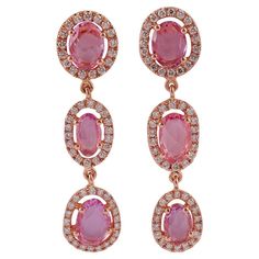 These are an exclusive earrings with Pink sapphire & diamonds features 6 pieces of Sapphire weight 2.86 carats, surrounded with 111 pieces of round brilliant cut of diamonds weight 0.69 carats, These entire earrings are studded in 18k rose Gold. earrings have a simple pull & push mechanism. Luxury Gold Jewelry With Pink Sapphire, Luxury Pink Rose Cut Diamond Earrings, Sapphire And Diamond Earrings, Dope Jewelry, Diamond Earring, Large Gift, Pink Earrings, Dream Jewelry, Sapphire Diamond