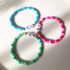 Discover the joy of Trio Friendship Bracelets for kids! These colorful, adjustable bracelets are perfect for celebrating the special bond between friends. Made from durable, skin-friendly materials, they are safe and comfortable for everyday wear. Each set includes three matching bracelets, making them ideal for sharing with best friends. Perfect for birthday gifts, party favors. Trio Friendship Bracelets are a fun and meaningful way for kids to express their friendship. Shop now and let the adv Swear Word Bracelet, Trio Clay Bead Bracelets, Matching Trio Bracelets, Clay Bracelet Ideas Y2k, Best Friend Clay Bead Bracelets, Trio Matching Bracelets, Bracelet Ideas For Best Friends, Matching Friendship Bracelets Beaded, Trio Bracelet Ideas