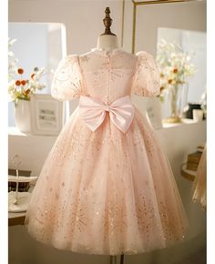 Buy high-end pink tulle with bling sequins girls pageant gown with bubble sleeves at wholesale price online. Free shipping and pro custom service since 2009. Princess Glitter Tulle Pageant Dress For Prom Season, Princess Style Pageant Dress In Glitter Tulle, Princess Style Glitter Tulle Pageant Dress For Prom, Christmas Princess Dress In Pink, Pink Princess Dress For Holiday, Princess Style Tulle Gown For Christmas, Princess Ball Gown For Prom Holiday, Princess Style Ball Gown For Prom And Holidays, Christmas Princess Tulle Gown