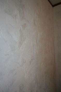 a white wall with some paint on it