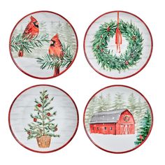 four plates with christmas designs on them