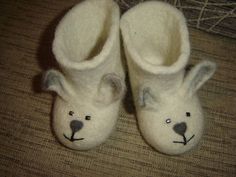 Felted slippers Bunnies will warm favorite legs Handmade Cute Booties, Handmade White Closed Toe Booties, Soft Sole Felt Slippers With Round Toe, Handmade Round Toe Slippers For Gifts, Handmade Slip-on Slippers As Gift, Handmade Round Toe Booties As Gift, Handmade Slip-on Slippers For Gift, Handmade Closed Toe Slippers As Gift, Handmade Round Toe Booties Gift