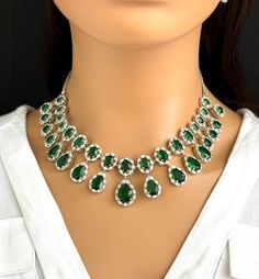 Indulge in the handcrafted excellence of our Green Zircon Necklace and let it illuminate your wardrobe with its unique allure. With limited pieces available, this necklace isn't just jewelry; it's a wearable piece of art that promises to bring a touch of luxury to your life. Regular Size And Adjustable with rhodium finish Ships from California, USA Delivery in 2-5 business days in the USA. Other colors can be found here https://www.etsy.com/listing/1423096838/ruby-cz-diamond-bridal-necklace-amer Hand Set Emerald Necklaces For Formal Occasions, Formal Bridal Necklace With 17 Jewels And Emerald, Formal Hand Set Emerald Necklaces, Exquisite Jeweled Emerald Necklace For Anniversary, Formal Hand-set Emerald Necklaces, Dazzling Jeweled Emerald Necklace For Formal Events, Formal Hand Set Emerald Necklace, Exquisite Emerald Bridal Necklace, Diamond Jeweled Necklaces For Anniversary